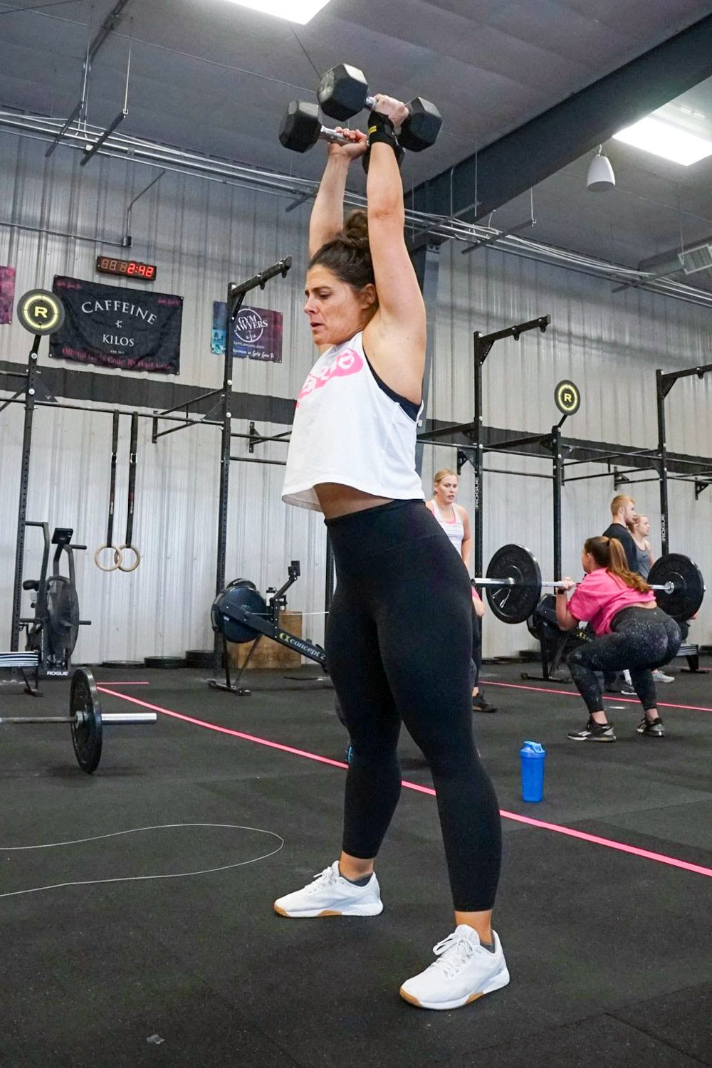 Jamie Jensen doing crossfit exercises after successfully completing physical therapy in Omaha