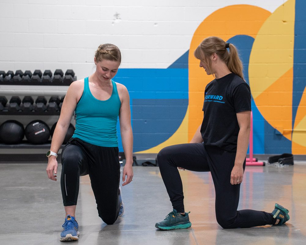 2 women doing physical therapy together in omaha