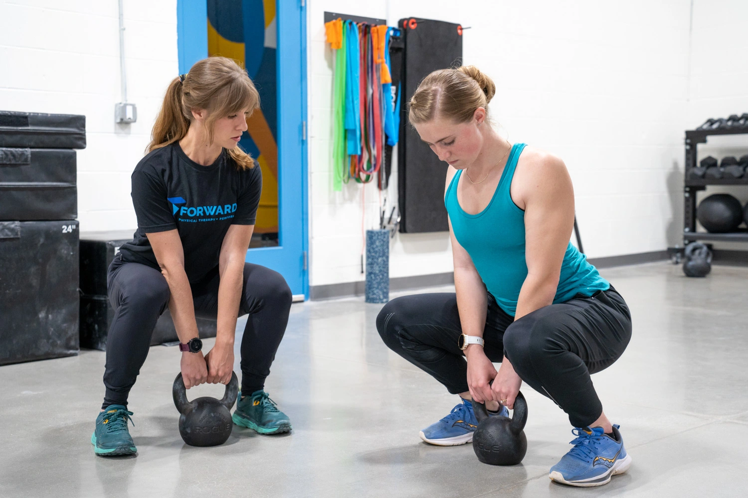 kettlebell squats for sports rehabilitation in omaha