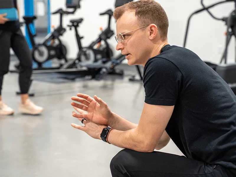 Dr. Vince Van Haute encouraging an athlete at Omaha physical therapy clinic