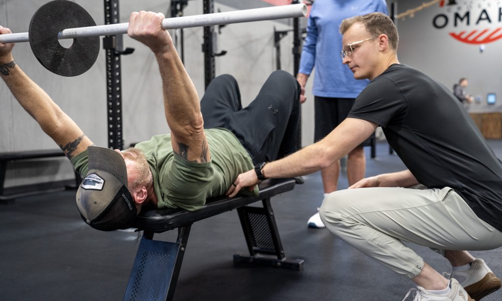 a man does physical therapy to alleviate his shoulder pain in omaha